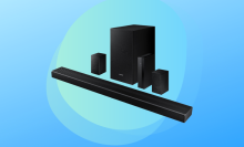 Samsung soundbar system with rear speakers and subwoofer against blue background