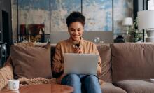 Woman looking at laptop 