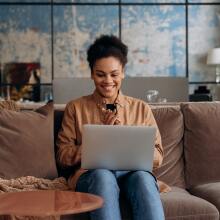 Woman looking at laptop 