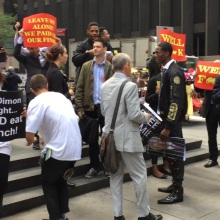 A Bitcoin mining company organized a fake protest at a major New York blockchain conference