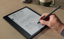 a person writes on the amazon kindle scribe with the included pen