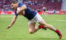 Antoine Dupont scores a try during rugby sevens