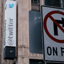 Twitter HQ with a 'no right turn on red' sign