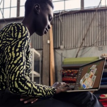 person typing on macbook air