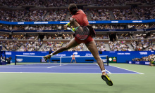 Coco Gauff of the United States returns a shot