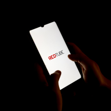 In this photo illustration a Redtube logo seen displayed on a smartphone screen