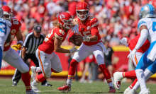 Patrick Mahomes of the Kansas City Chiefs fakes a handoff