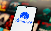 close up of phone with paramount+ logo