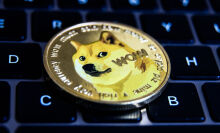 A dogecoin on a keyboard.