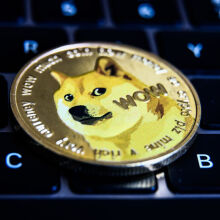 A dogecoin on a keyboard.