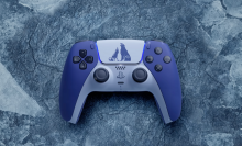 the 'God of War Ragnarök' DualSense controller against an icy gray backdrop