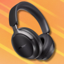 Bose QuietComfort Ultra headphones on orange abstract background