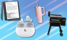 an amazon kindle scribe, a pair of white beats studio earbuds, a pink hydro flash water bottle with pink straw, and a black traeger barbecue all sit on a light blue background that has lighter blue streaks running though it diagonally 