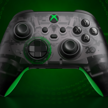 the 20th anniversary special edition xbox controller against a futuristic green background