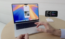 a Mac with an iPhone mirrored on its screen