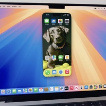 MacBook featuring iPhone mirroring feature on screen