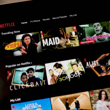 he Netflix website home screen on a laptop computer.