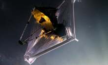 An illustration of the James Webb Space Telescope as it orbits the sun in our solar system, 1 million miles from Earth.