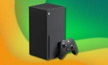 an xbox series x on a background of green and yellow