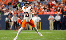 Bo Nix makes a pass for the Broncos