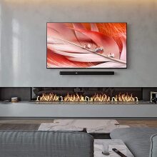 Sony HT-G700 soundbar mounted above living room fireplace