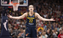  Caitlin Clark #22 of the Indiana Fever reacts to a foul 