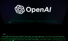 The OpenAI logo is being displayed on a laptop screen with a glowing green keyboard 