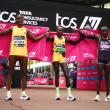 Second placed Tigst Assefa of Ethipoia, first placed Peres Jepchirchir of Kenya and third placed Joyciline Jepkosgei of Kenya celebrate winning the Women's elite race at London 2024