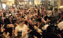 Breastfeeding mums stage a sit-in protest in Australian food court