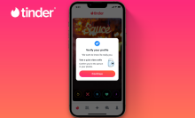 tinder display on phone with pink and orange background