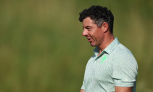 Rory McIlroy of Team Ireland walks on the 13th hole