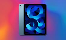 Apple iPad Air 5th gen against a colorful background 