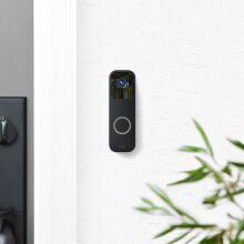 Blink video doorbell attached to a house