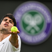 Alcaraz serves at Wimbledon