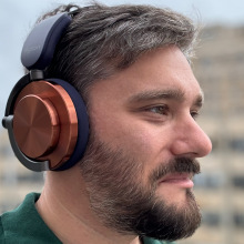 man wearing dyson ontrac headphones