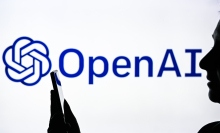 A face in profile in front of the OpenAI logo.