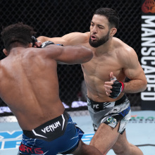 Nassourdine Imavov punches Chris Curtis in their middleweight fight during the UFC 289 event at Rogers Arena on June 10, 2023, in Vancouver, Canada.