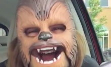 Woman unboxes Chewbacca mask, experiences ecstasy