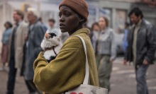 Sam (Lupita Nyong'o) and Frodo the cat cling together in "A Quiet Place: Day One."