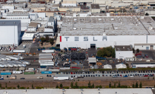 The Tesla Inc. assembly plant stands in this aerial photograph taken above Fremont, California, U.S.