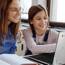 Two people using the Samsung Chromebook 4.