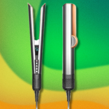 Dyson Airstrait hair straightener on green and yellow background