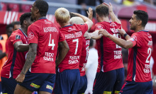 Players of Lille celebrate a goal