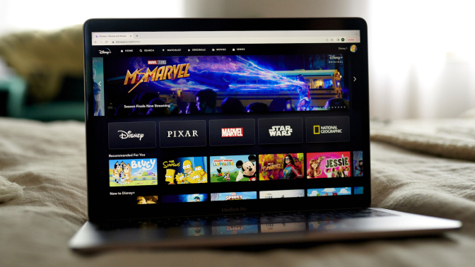 The Disney+ website shown on a laptop.