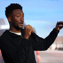 Marques Brownlee speaking at a creator-focused event 