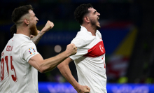 Turkey's defender Samet Akaydin celebrates