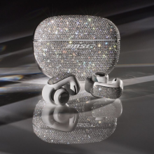 A pair of diamond-encrusted Bose Ultra Open Earbuds