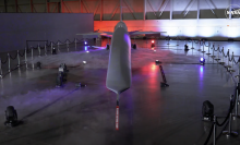 The first reveal of NASA's X-59 supersonic plane onstage at the Lockheed Martin Skunk Works facility in Palmdale, California.