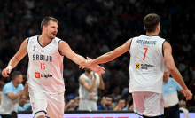 Serbia's Nikola Jokic and teammate Bogdan Bogdanovic