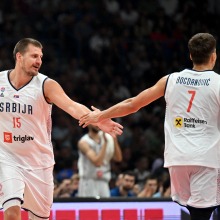 Serbia's Nikola Jokic and teammate Bogdan Bogdanovic